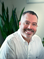 Portrait photo of Dominic Carter