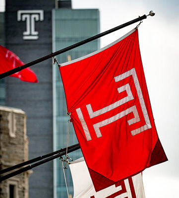 Temple University Morgan Hall and University Flags with Logo