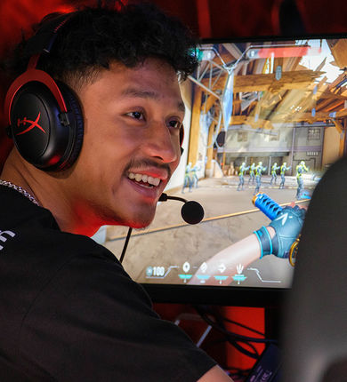A student is playing a video game.