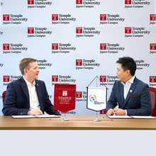 TUJ Dean Matthew Wilson (left) and AESF Director General Sebastian Lau (right) sign MoU at TUJ in Tokyo