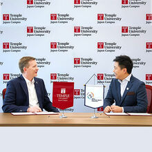 TUJ Dean Matthew Wilson (left) and AESF Director General Sebastian Lau (right) sign MoU at TUJ in Tokyo