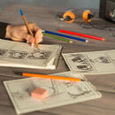 An image capturing the hands of a person drawing a picture on paper with a pencil.