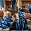 A picture of someone dyeing fabric