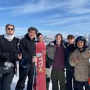 A picture of students smiling on the slopes in Hakuba.