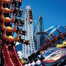 The roller coasters at the amusement park with a view of Mount Fuji