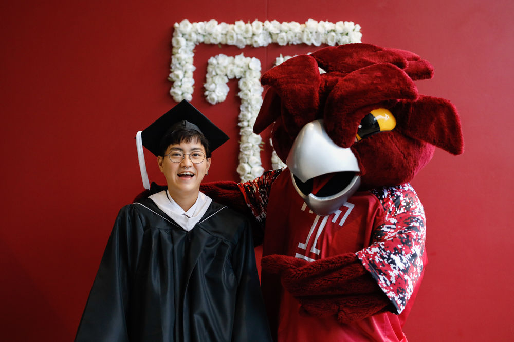 A graduate with Hooter