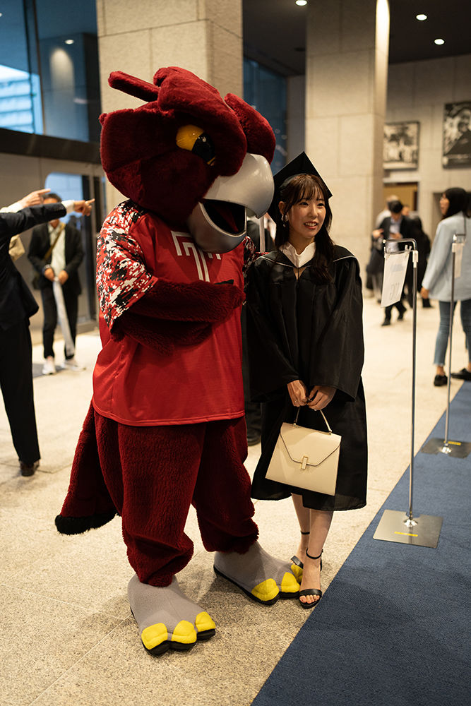 A graduate with Hooter