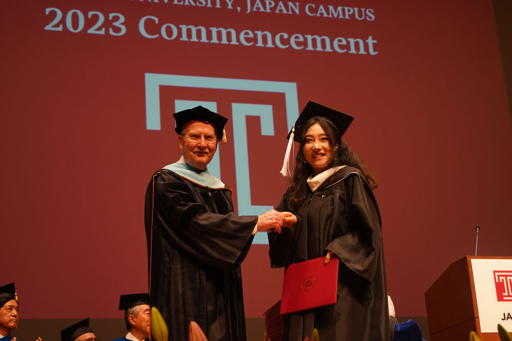 Chancellor Englert and a Graduate