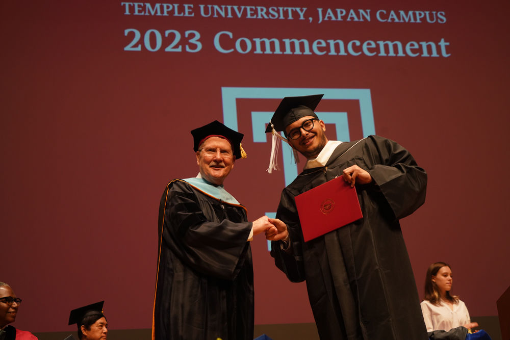 Chancellor Englert and a Graduate