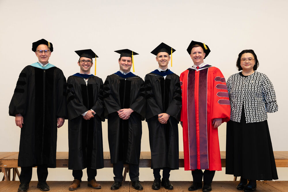 College of Education graduates with the Dean and the Executive Director