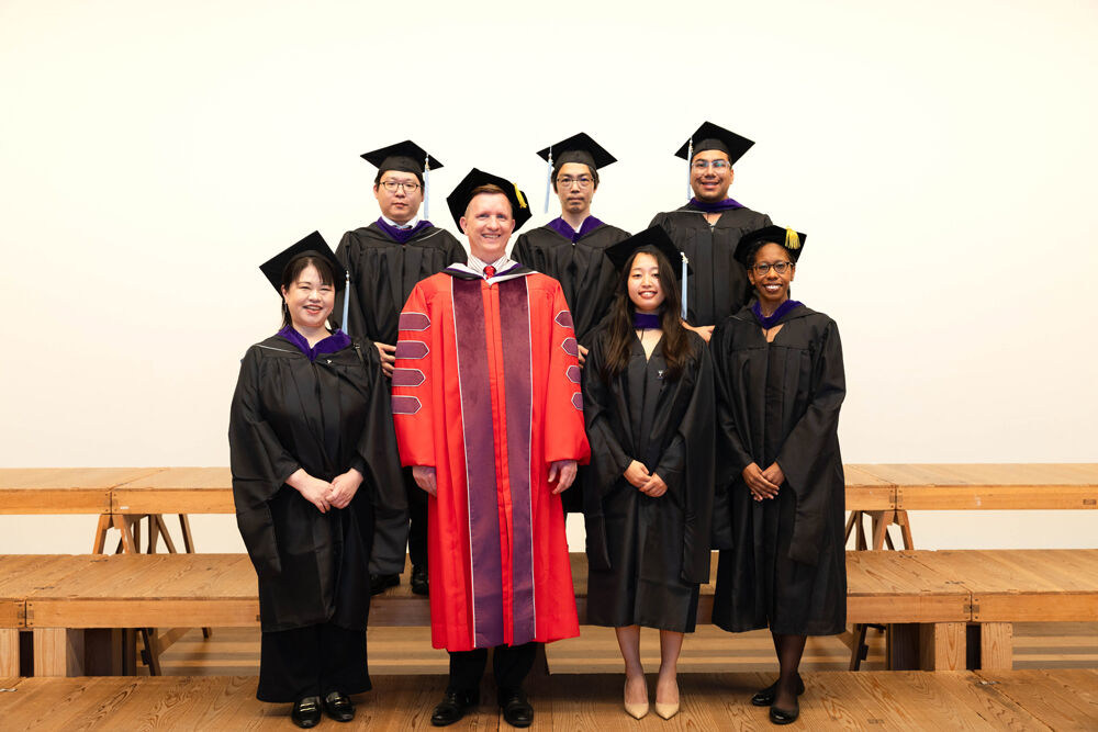 Beasley School of Law graduates with the Dean and the Program Director
