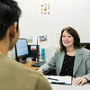 Erica Adams, director of career development giving student consultation.