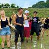 A picture of TUJ students planting rice