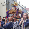 Students carry shrine (mikoshi) for the Kifune Shrine Festival