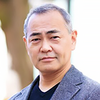 A portrait of Shinichi Izumi