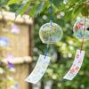 Japanese glass windchimes swaying in the breeze