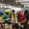 A group of students celebrate Halloween at the Witch Market