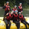 Students smiling on a raft in the Nagatoro River