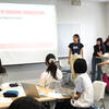 A student group giving a presentation in class