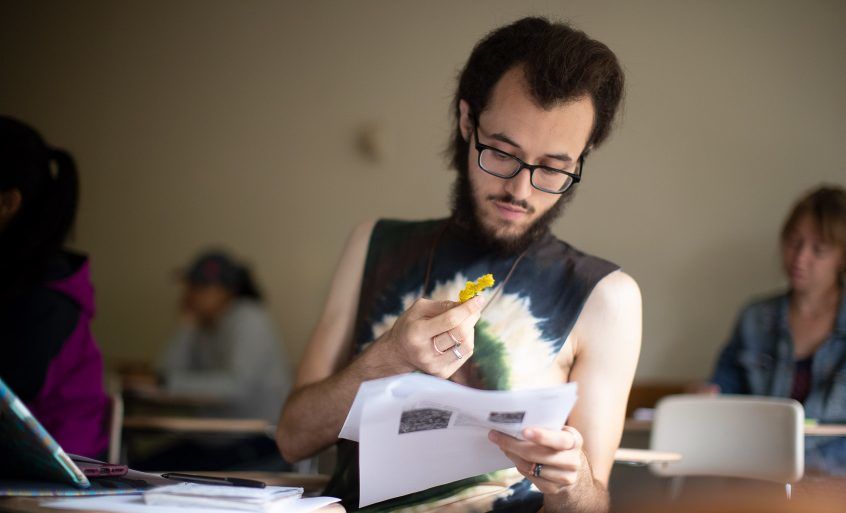 A student studying in his class.