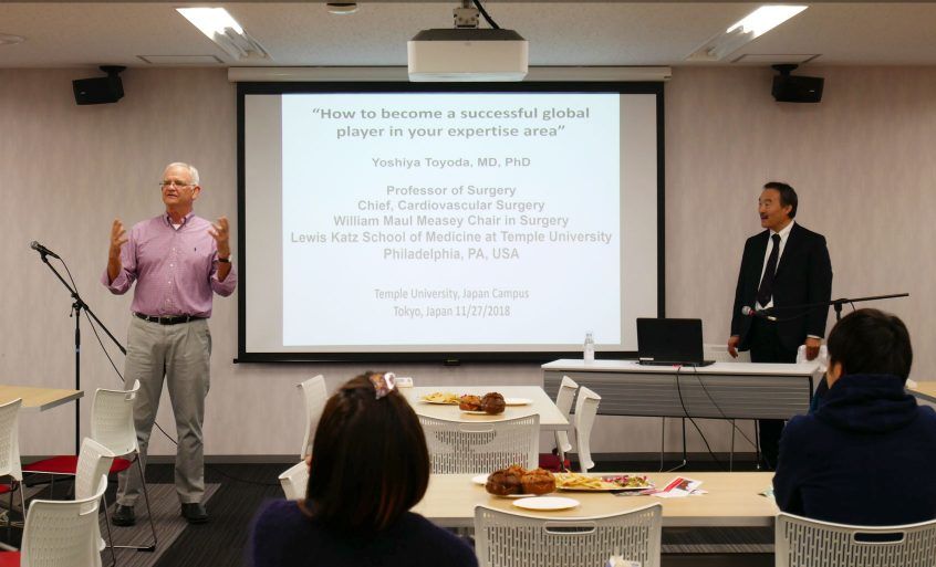 Dr. Toyoda (right) with TUJ Dean Bruce Stronach (left)