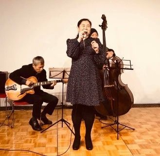 Mamiko Taira with her bandmates – Satoshi Inoue and Daiki Yasukagawa