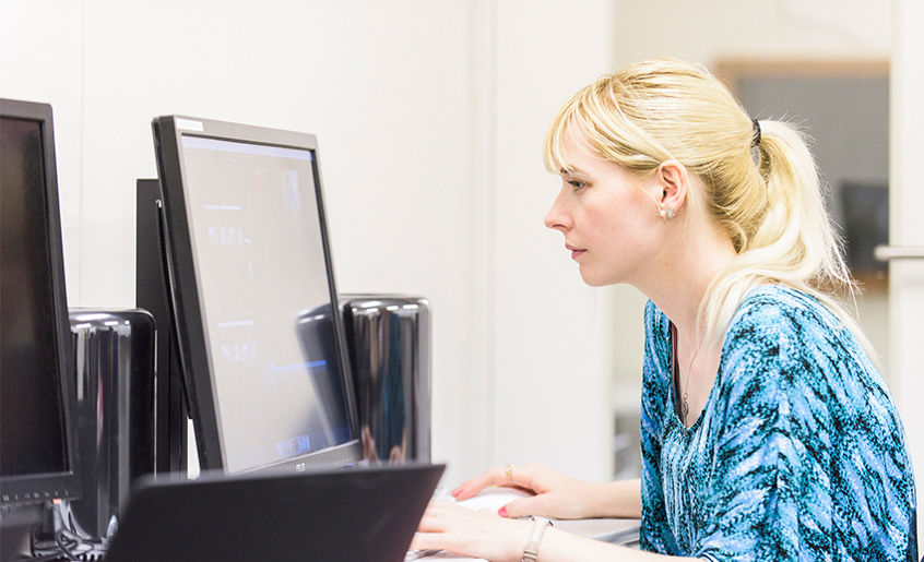 Student using Mac Pro in the computer lab.