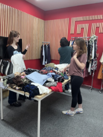 Students enjoying the first clothing giveaway
