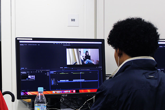 Student working on post-production